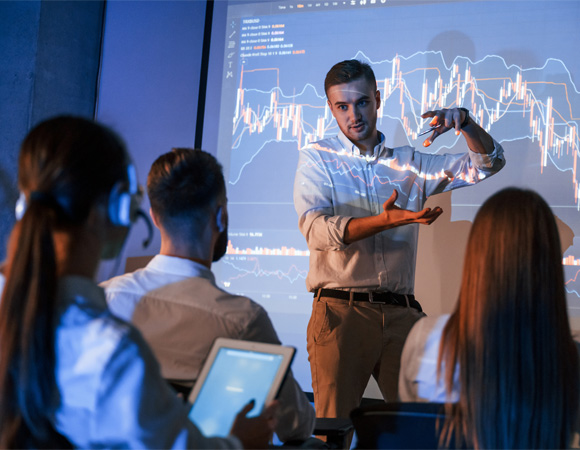 office man presenting meeting and data outlines with use of projector in office